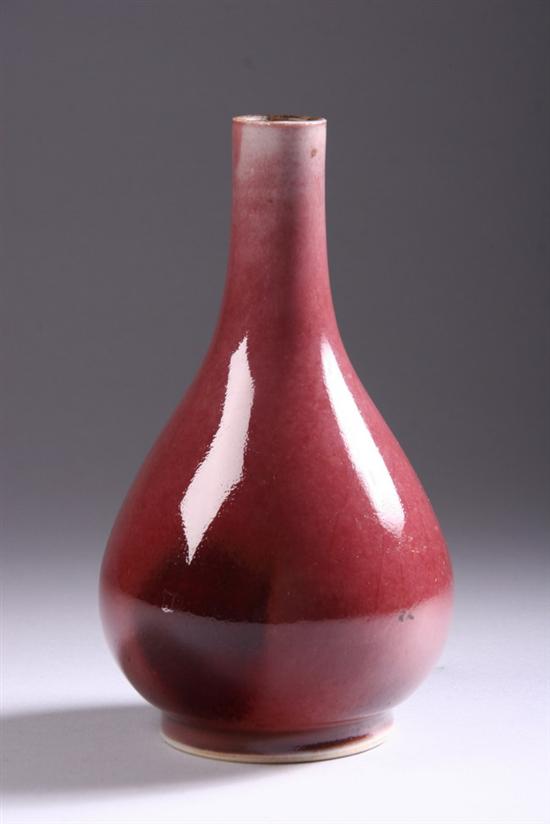 Appraisal: CHINESE COPPER RED GLAZED PORCELAIN BOTTLE VASE th century -