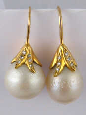 Appraisal: A pair of yellow metal tests carat gold cultured pearl