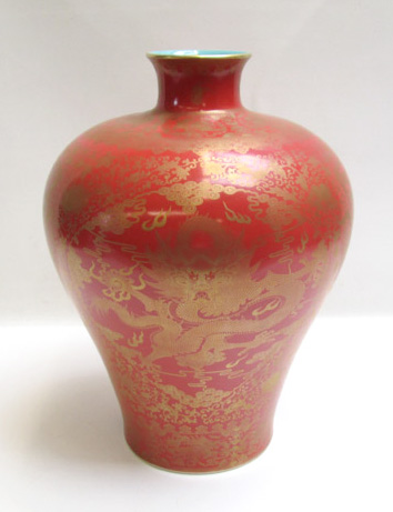 Appraisal: CHINESE BALUSTER FORM VASE having gilt floral and phoenix motif