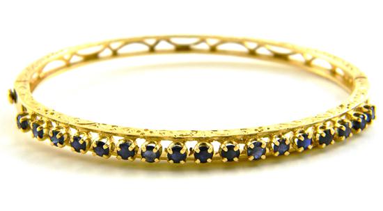 Appraisal: Hinged diamond bangle bracelet stamped and tested K yellow gold