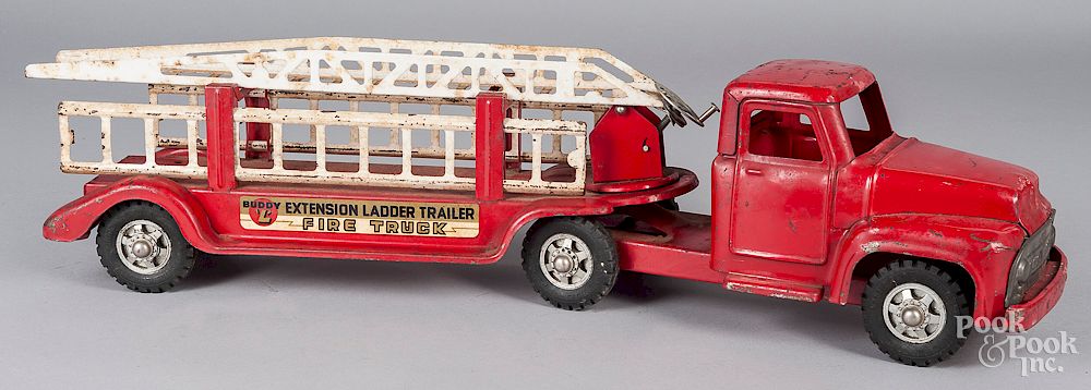 Appraisal: Two pressed steel fire ladder trucks Two pressed steel fire