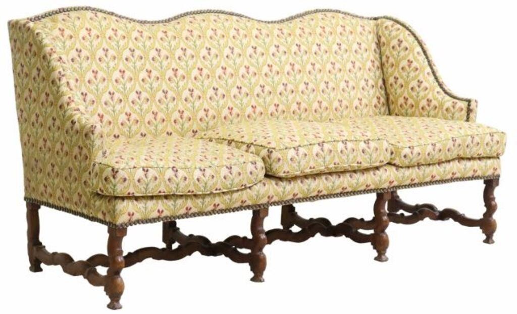 Appraisal: French Louis XIII style three-seat sofa th c having scalloped