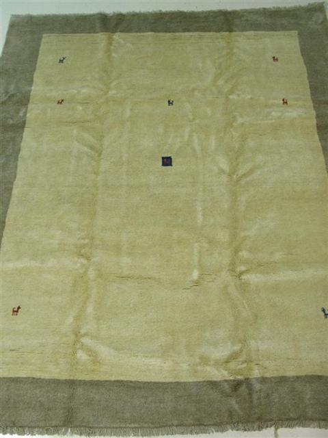 Appraisal: PERSIAN GABBEH STYLE RUG With traditional tribal decoration on varigated