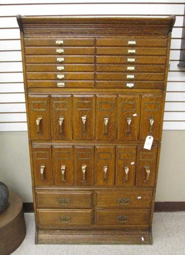 Appraisal: A FOUR-STACK OAK FILE CABINET Grand Rapids Michigan early th