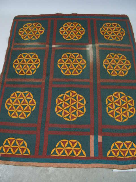 Appraisal: NC Hand Stitched Quilt Late th c nine complete roundel