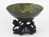 Appraisal: A turned moss agate bowl cm dia on hardwood stand