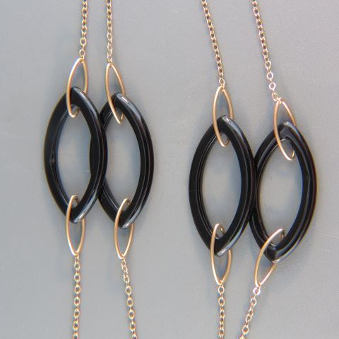 Appraisal: k Gold Black Onyx Necklacemarquise style long