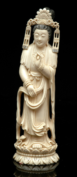 Appraisal: A CARVED IVORY FIGURE OF A GEISHA The standing female