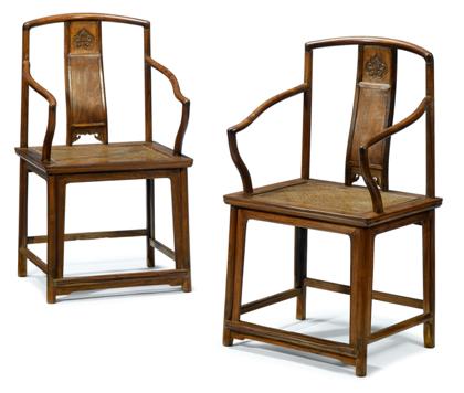 Appraisal: Good pair of Chinese huanghuali armchairs The rounded horseshoe back