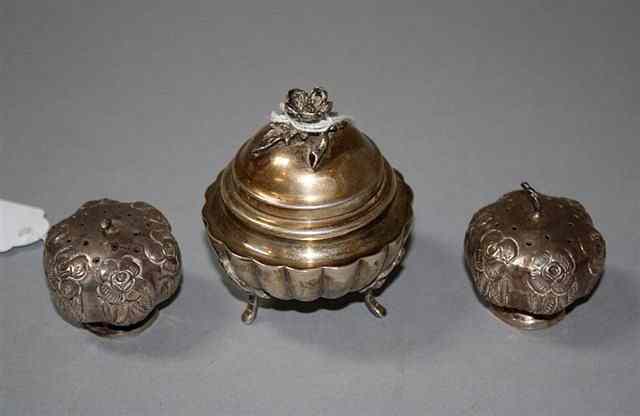 Appraisal: A PAIR OF MEXICAN SILVER PEPPERS in the form of