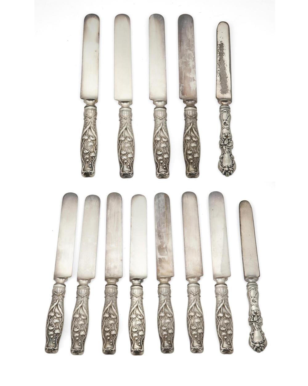 Appraisal: A GROUP OF STERLING SILVER KNIVESA group of sterling silver