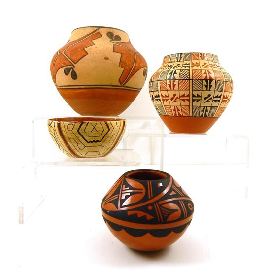 Appraisal: TRIBAL Four pieces of Southwestern pottery all with orange and