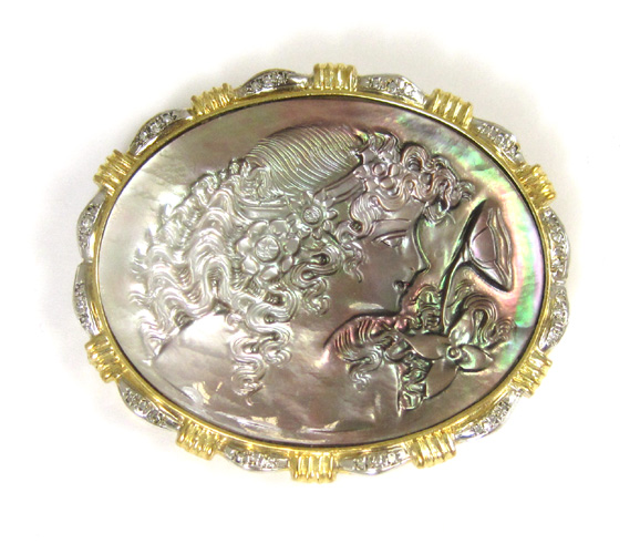 Appraisal: CARVED MOTHER OF PEARL CAMEO BROOCH WITH FOURTEEN KARAT GOLD