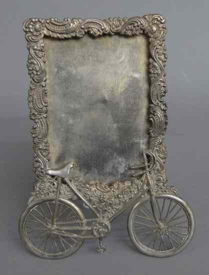 Appraisal: Early raised metal casting bicycle picture frame '' x ''