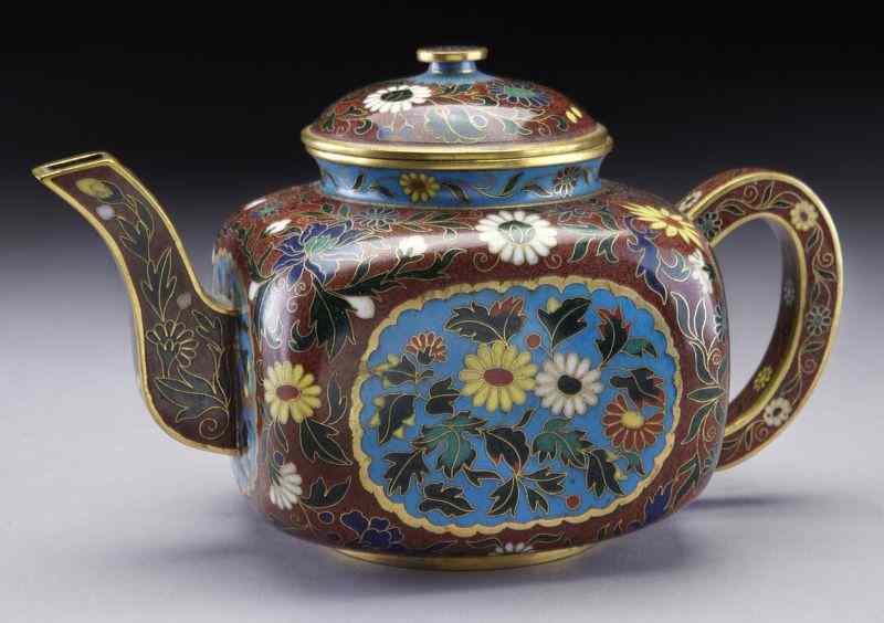 Appraisal: Chinese cloisonne teapot depicting chrysanthemumand flowers ''H x ''W Circa