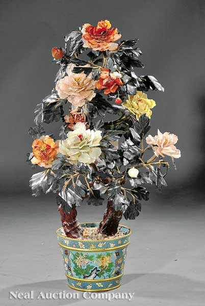 Appraisal: A Monumental Chinese Hardstone Flowering Tree in a Cloisonn Enamel