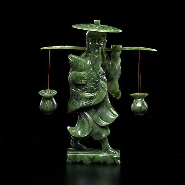 Appraisal: Spinach Jade Fisherman Chinese th century A spinach jade standing