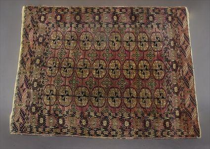 Appraisal: TEKKE TURCOMAN RUG The wine red field worked with rows