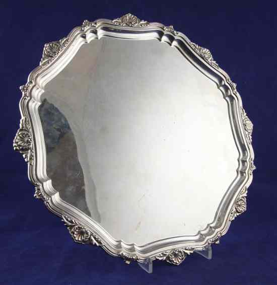 Appraisal: A 's silver salver of shaped circular form with shell