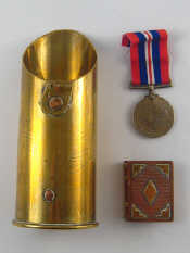 Appraisal: Trench art A well made cigarette lighter forming a book