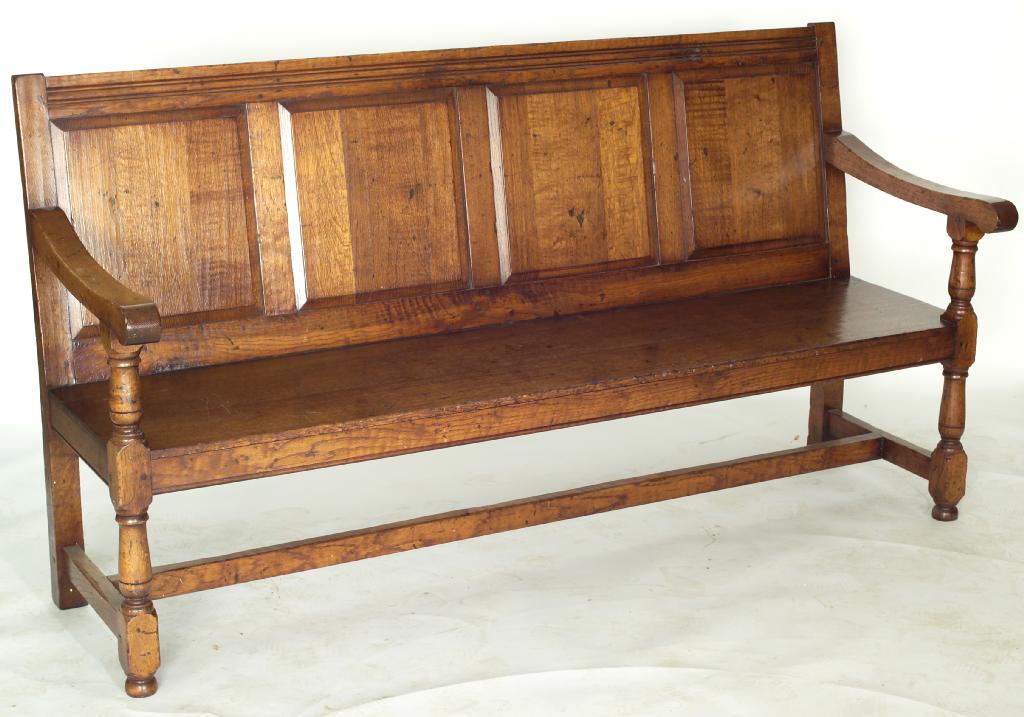 Appraisal: GEORGE III OAK SETTLE late th century the four-panelled back