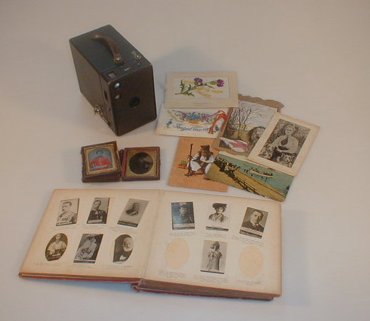 Appraisal: An Ogden's cigarette card album two Victorian daguerreotype portraits a