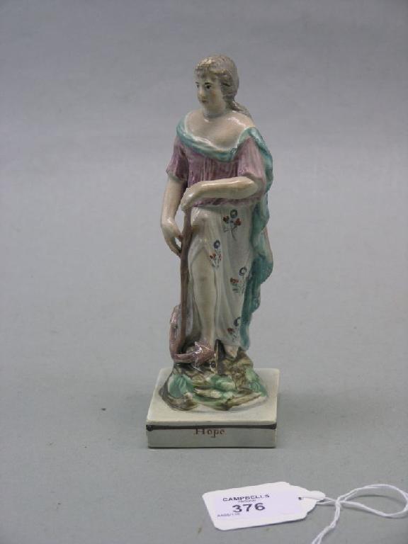 Appraisal: A late th century Staffordshire pottery figure 'Hope' female figure