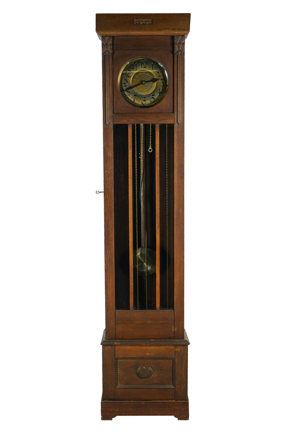 Appraisal: GERMAN OAK TALL CASE CLOCKthe metal dial unsigned with movement