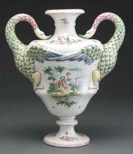 Appraisal: Rare large French Veuve Perrin faience urnwith bird form handles