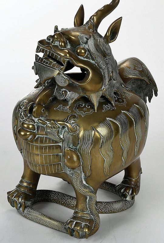 Appraisal: Chinese Bronze Qilin Form Censer qilin standing on snake hinged