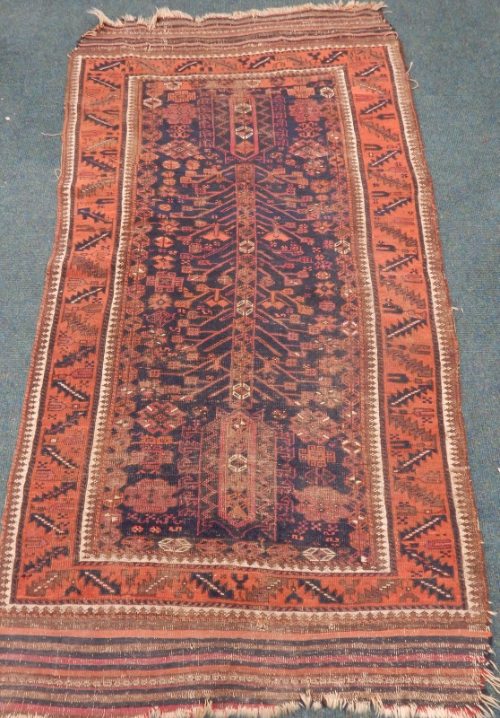 Appraisal: A Persian rug with a design of flowers and other