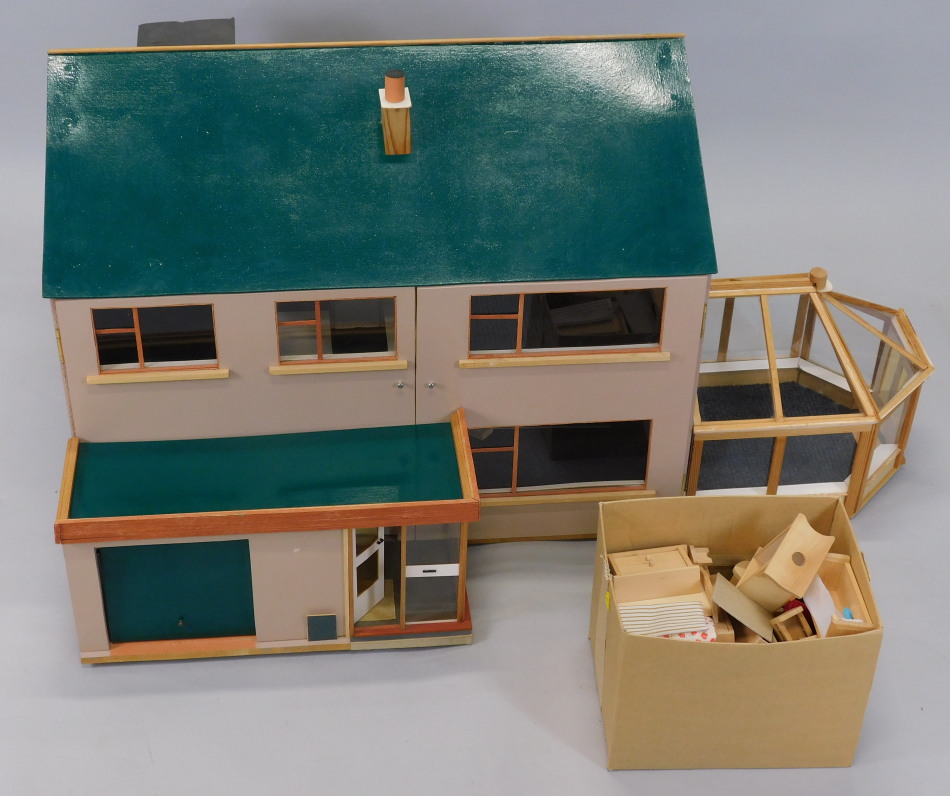 Appraisal: A modern dolls' house with green painted roof and grey