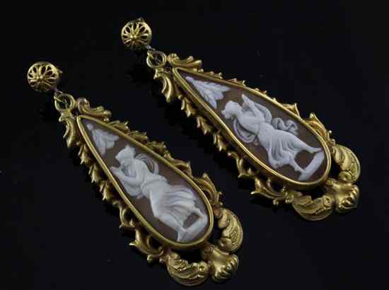 Appraisal: A pair of Victorian gold mounted cameo drop earrings ins