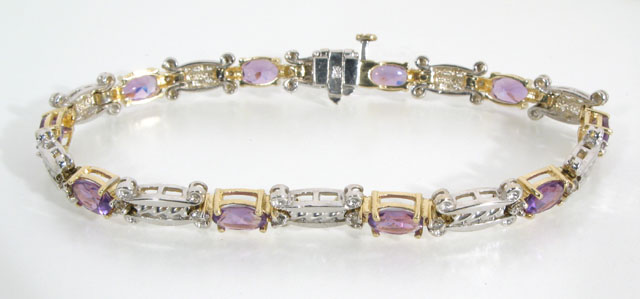 Appraisal: AMETHYST DIAMOND FOURTEEN KARAT WHITE AND YELLOW GOLD LINE BRACELET