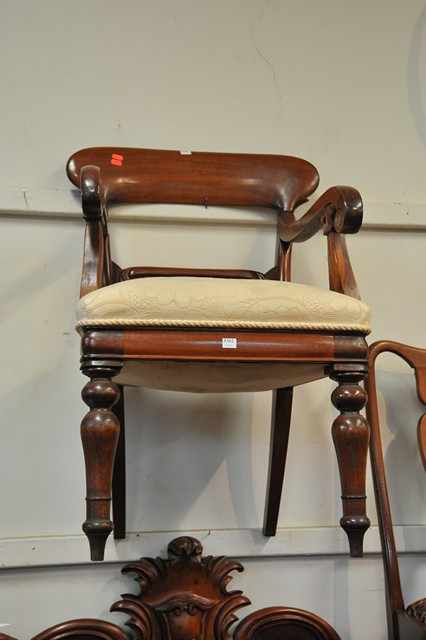 Appraisal: A VICTORIAN MAHOGANY SPADE BACK ARMCHAIR