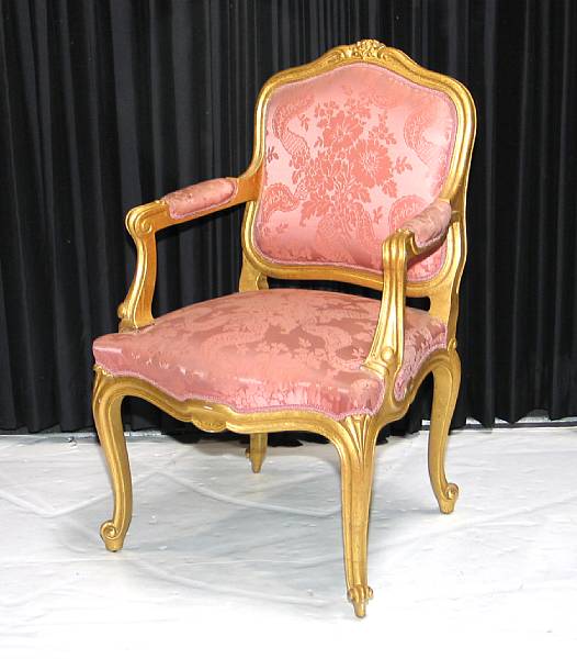 Appraisal: A pair of Louis XV style giltwood fauteuils mid th