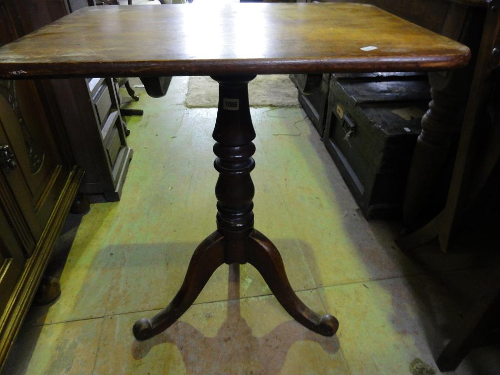 Appraisal: A Victorian mahogany tilt top occasional table of rectangular form