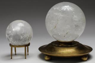 Appraisal: Cloudy Quartz Crystal Globes On gilt metal bases Largest diameter