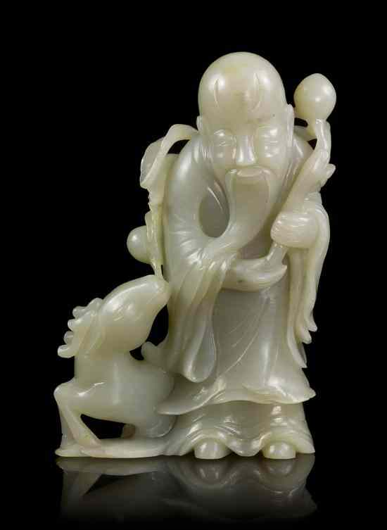 Appraisal: A Nephrite Jade Carving of a Robed Sage of a