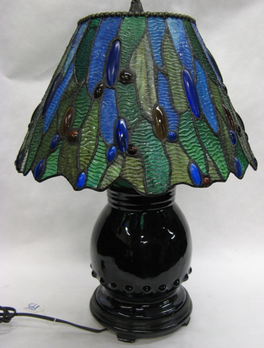 Appraisal: STAINED LEADED GLASS TABLE LAMP blue pottery based having a