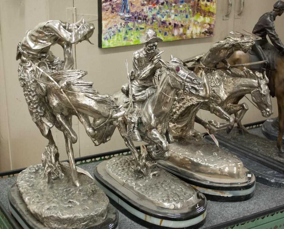 Appraisal: AFTER FREDERIC SACKRIDER REMINGTON AMERICAN - three silvered bronze sculptures