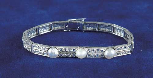 Appraisal: ART DECO DIAMOND AND BAROQUE PEARL BRACELET Elegant bracelet is