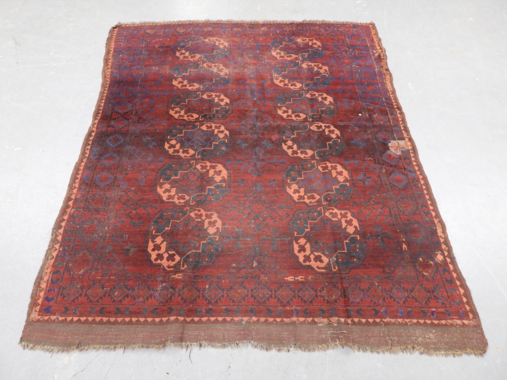 Appraisal: ANTIQUE ERSARI RUG Middle East Circa Dark red and navy