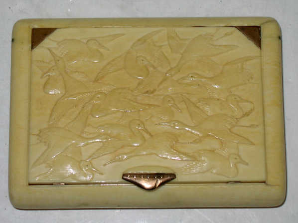 Appraisal: JAPANESE CARVED IVORY CASE Rectangular with rounded corners and hinged