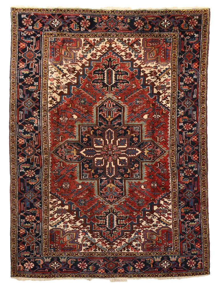 Appraisal: Heriz Carpet th century blue polygonal central medallion on red