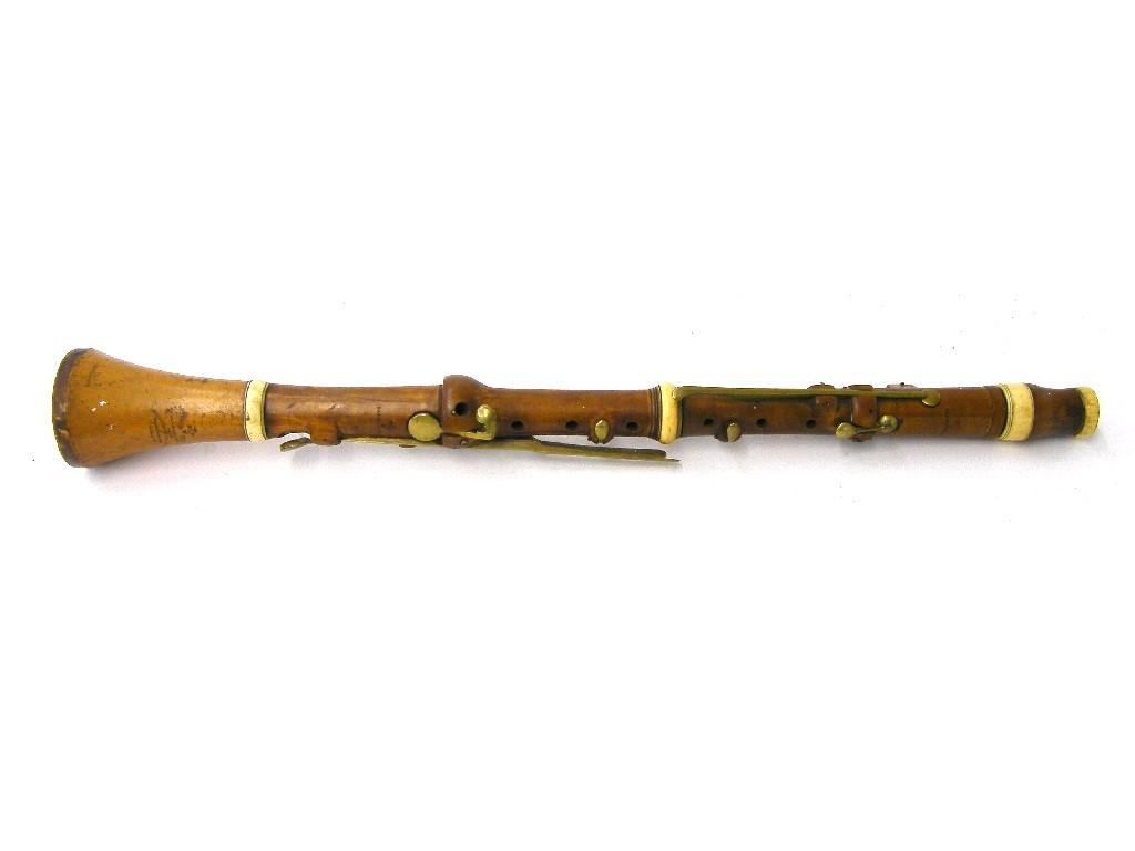 Appraisal: th century boxwood and ivory mounted clarinet by and stamped