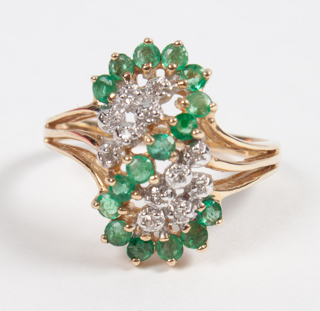 Appraisal: Lady's K gold emerald and diamond ring emeralds form an