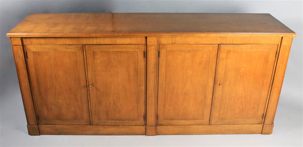 Appraisal: BAKER CHERRY CREDENZA the rectangular molded top over pairs of