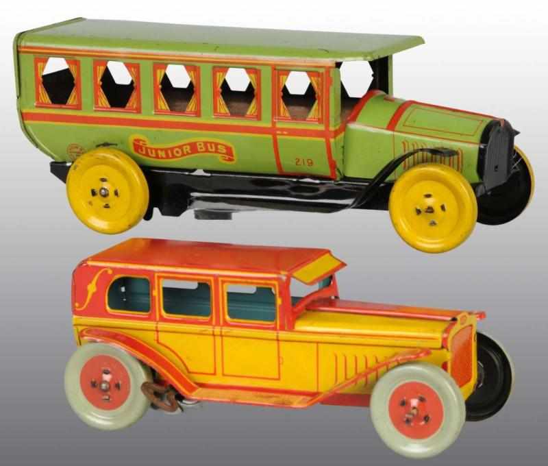 Appraisal: Lot of Tin Chein Vehicle Toys Description American Working Includes