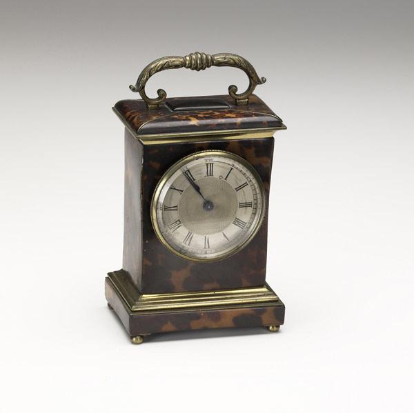 Appraisal: ENGLISH TORTOISESHELL CLOCK With brass handle th C